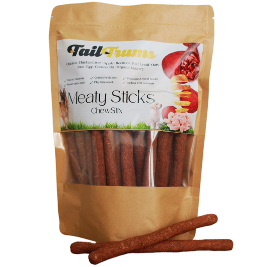Package of Tail Thums Meaty Sticks Chew sticks with two sticks in front on a white background